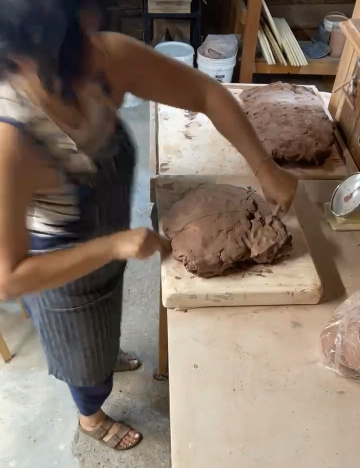 action shot of recycling clay to be used again
