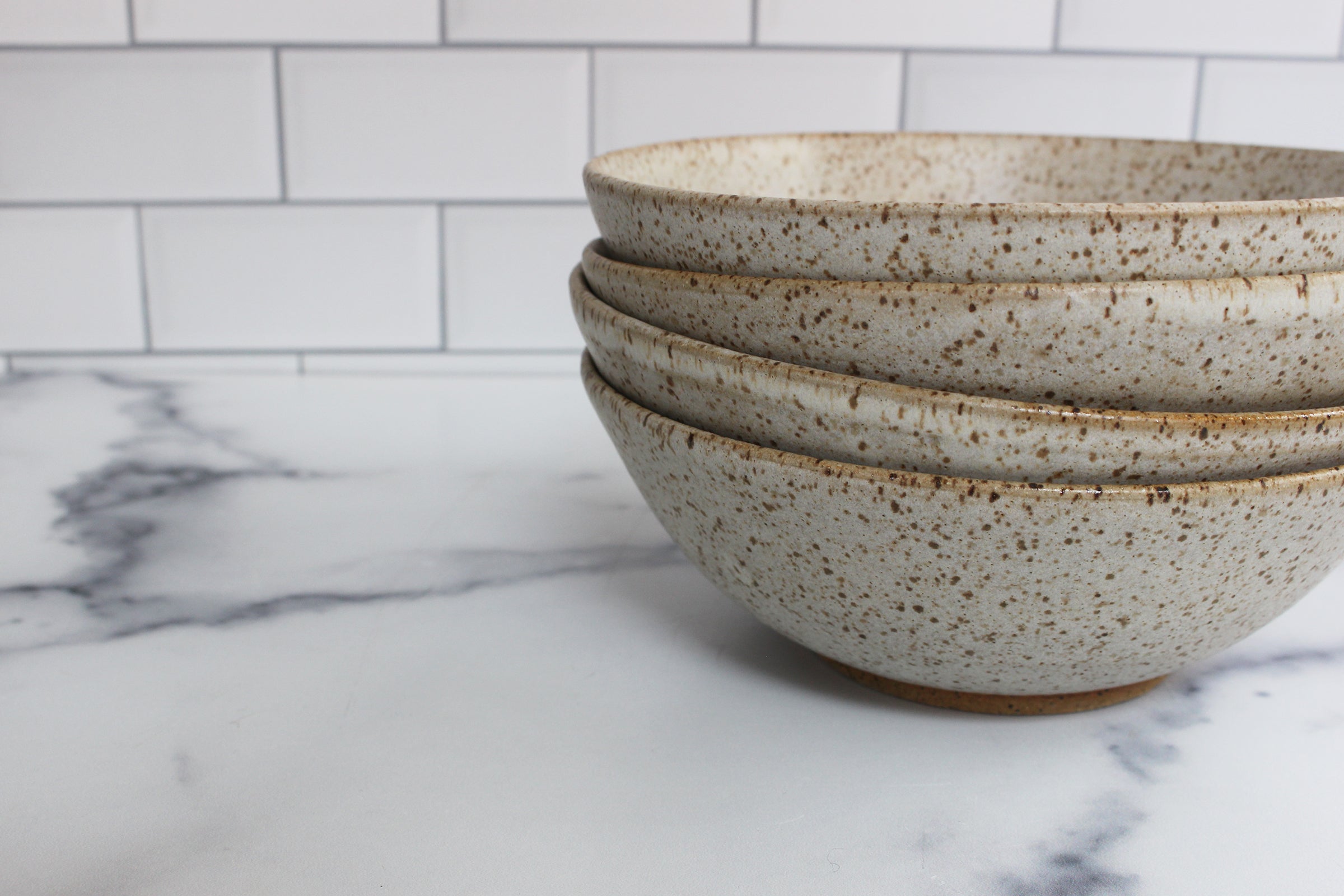 set of 4 cereal bowls on the kitchen counter