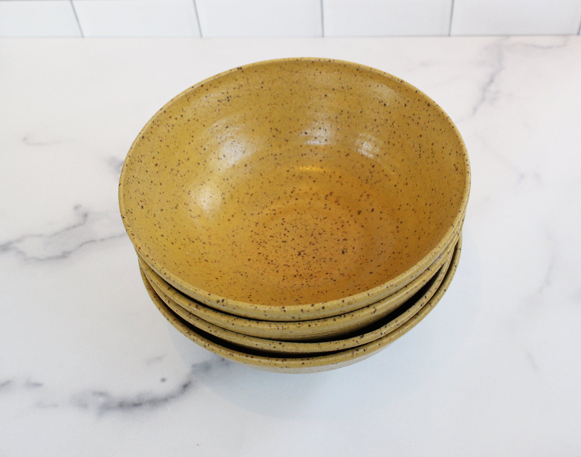 wheel thrown yellow cereal bowls