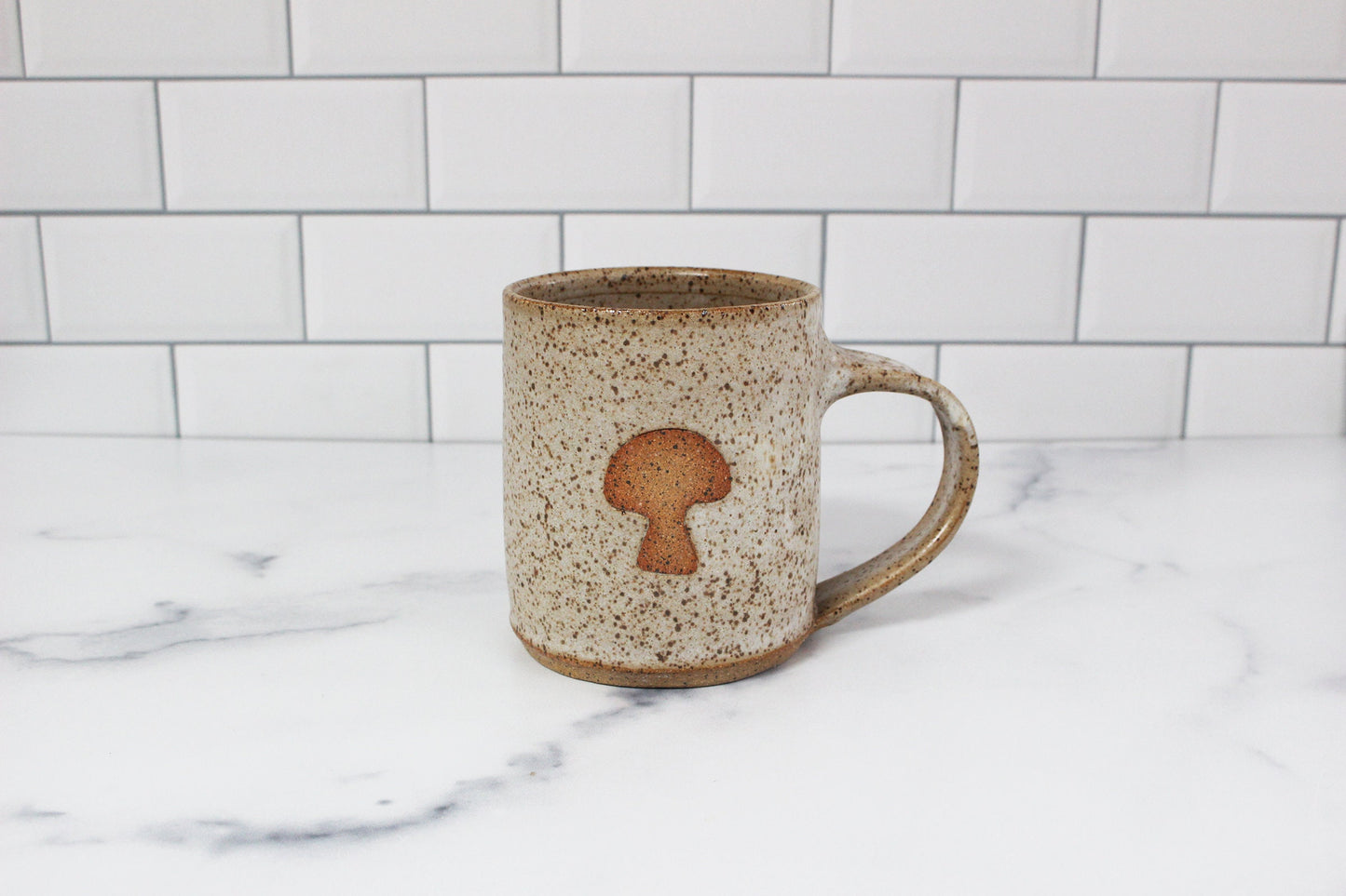 white and brown mushroom pottery